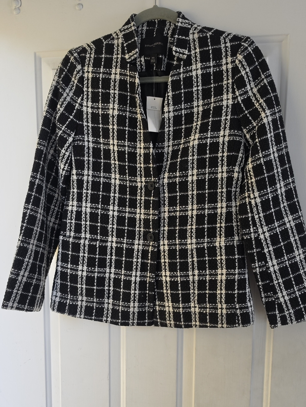Banana Republic blazer is a black and white bouclé check jacket.